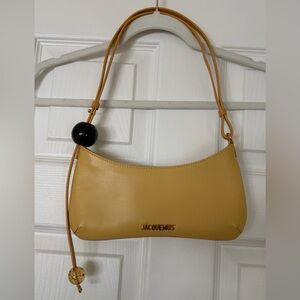 Jacquemus Le Bisou Perle in Dusty Yellow